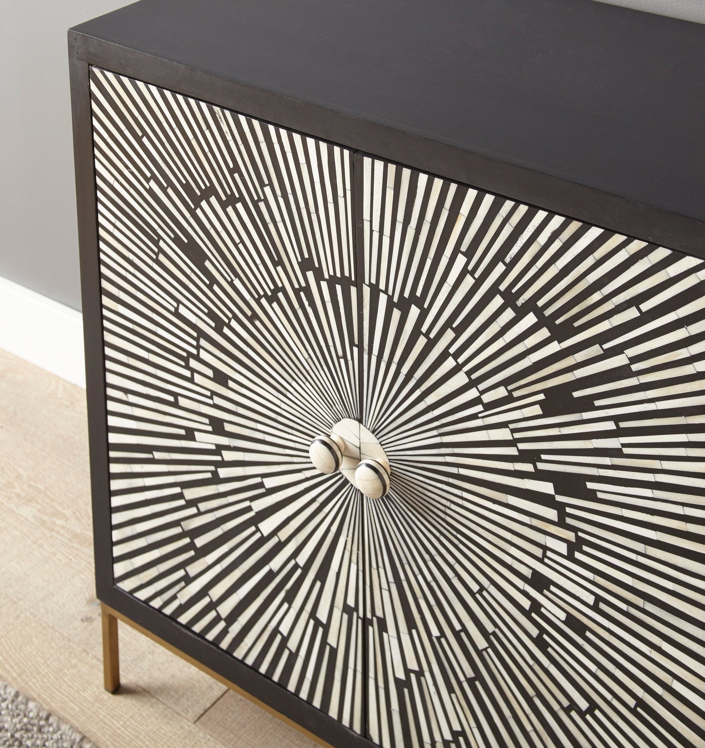 Amika - 2 Door Sunburst Bone Cabinet - Black