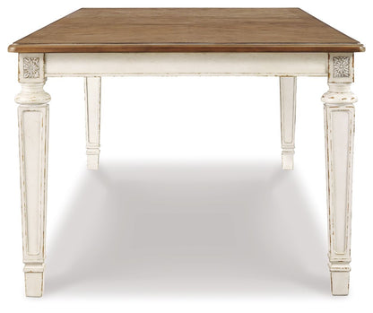 Realyn - Chipped White - Mesa extensible rectangular para comedor