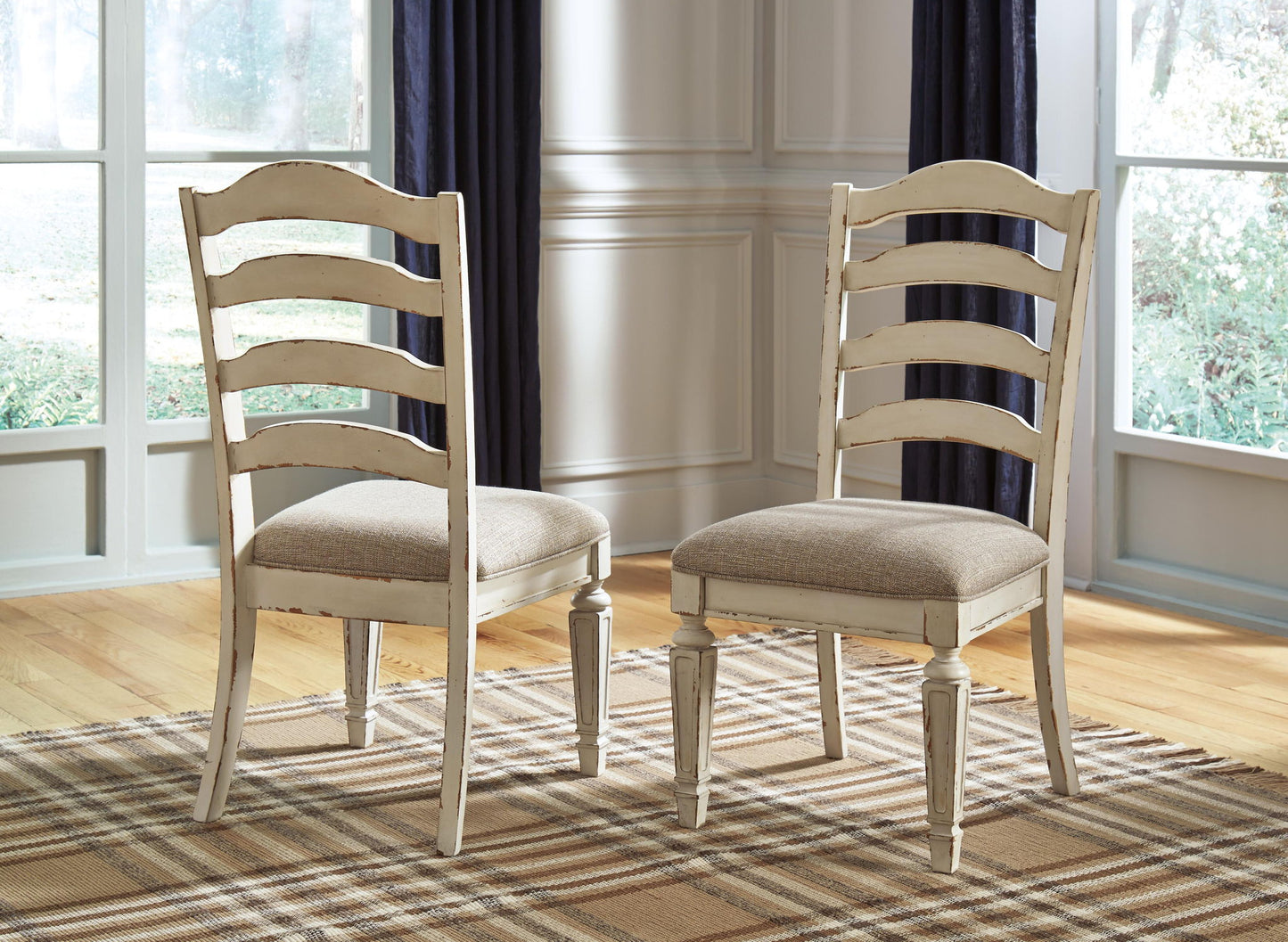 Realyn - Chipped White - Silla auxiliar de comedor Uph (juego de 2) - Ladderback