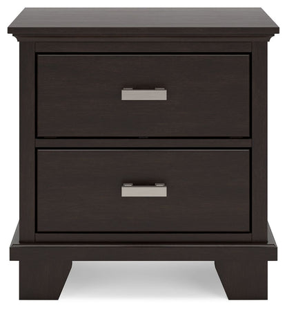 Dark wood nightstand with two drawers and silver metal handles. Sturdy base with square legs.