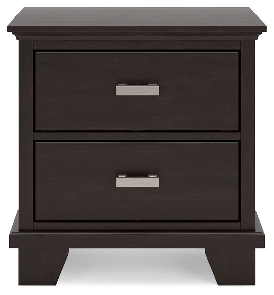 Dark wood nightstand with two drawers and silver metal handles. Sturdy base with square legs.