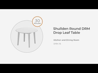 Shullden - Gris - Mesa redonda Drm Drop Leaf